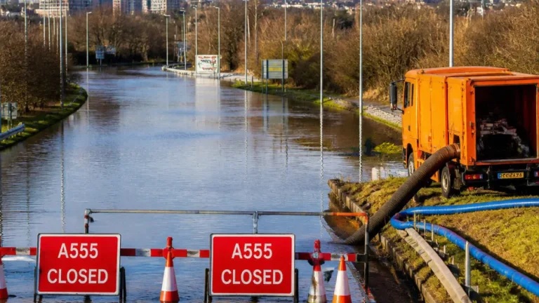 Stockport council examines fresh measures after A555 flooding closes road in extreme weather